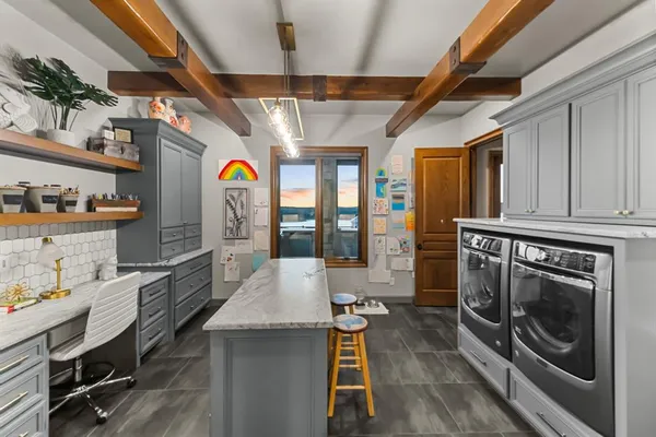 a bathroom with a toilet a sink and a mirror