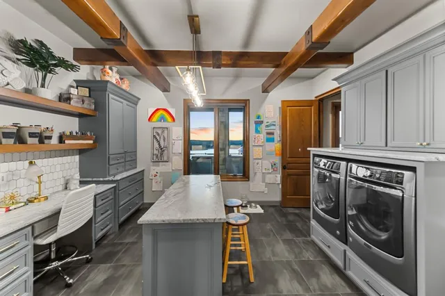 a bathroom with a toilet a sink and a mirror