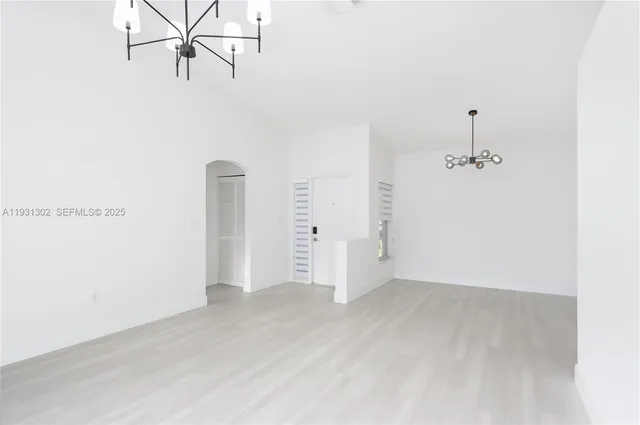 an empty room with fan