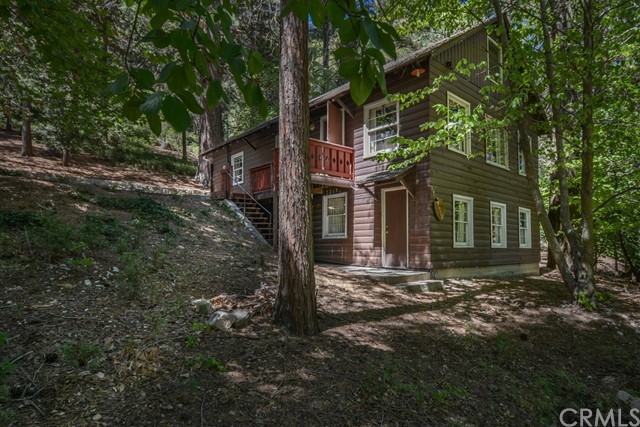 686 Cottage Grove Road Lake Arrowhead, CA 92352 - Photo 1 of 1 Nestled under dogwoods and cedar trees for serenity and quiet.