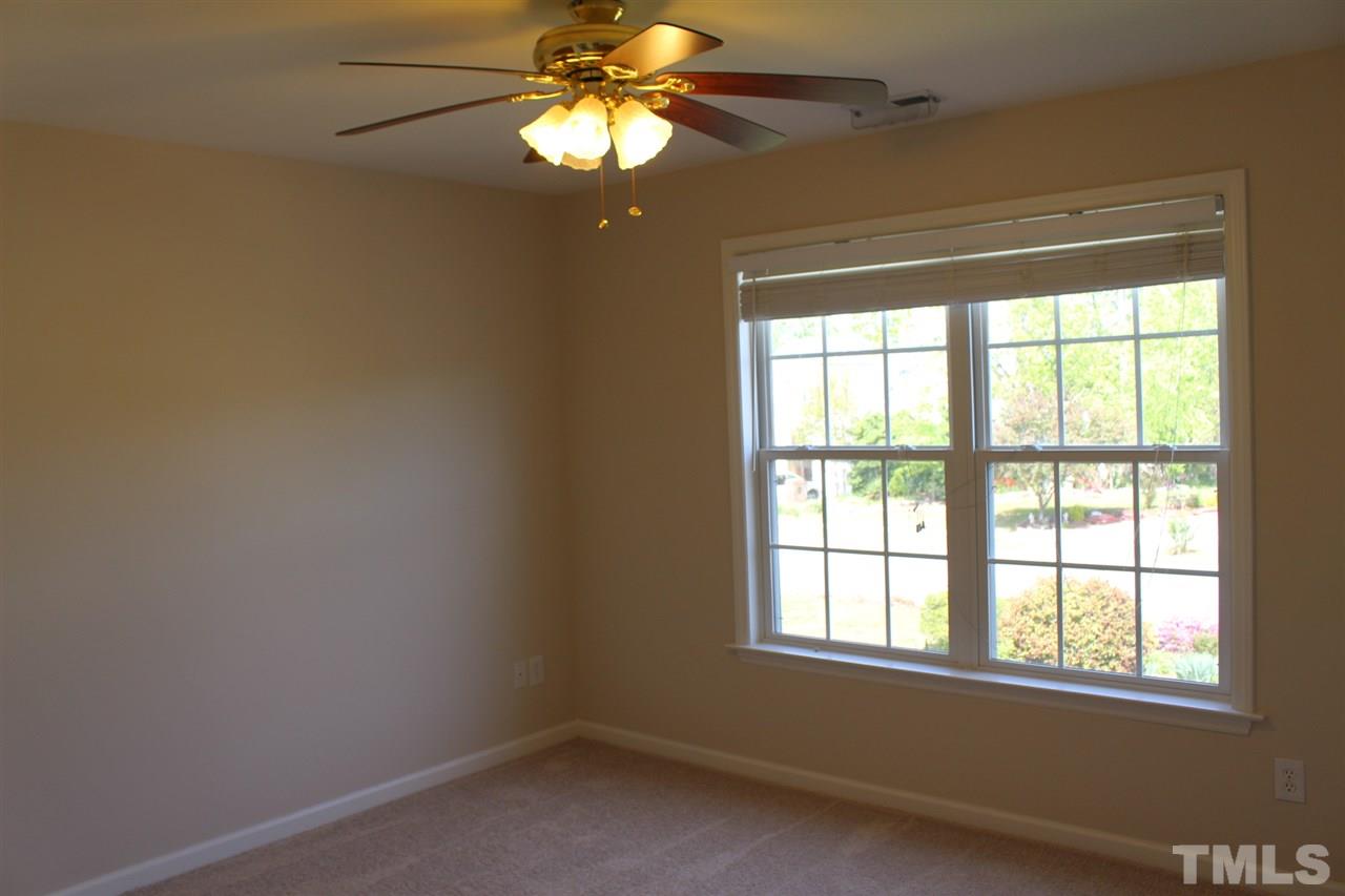 1817 White Dogwood Road Apex, NC 27502 - Photo 12 of 13 an empty room with a window