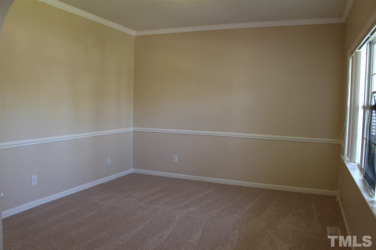 1817 White Dogwood Road Apex, NC 27502 - Photo 4 of 13 a view of an empty room