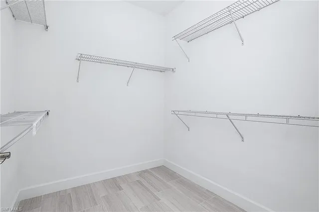 a view of a room with racks on the wall