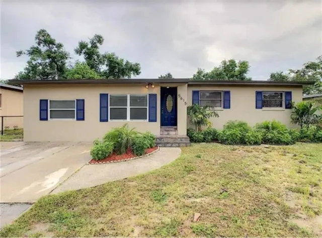 front view of a house with a yard