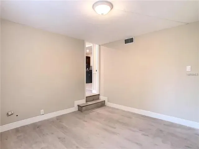 an empty room with closet