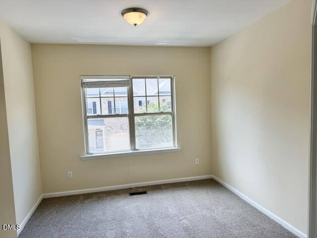 8227 Primanti Boulevard Raleigh, NC 27612 - Photo 19 of 25 an empty room with a window