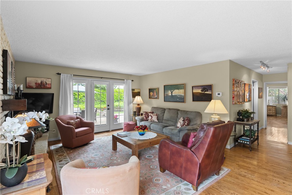 802 Pierce Drive Santa Maria, CA 93454 - Photo 12 of 42 a living room with furniture fireplace and a window