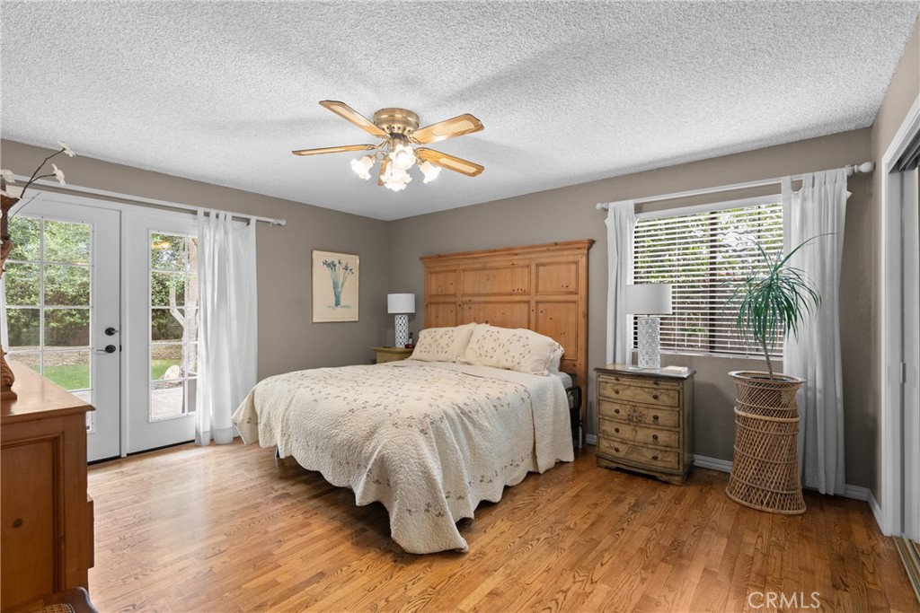 802 Pierce Drive Santa Maria, CA 93454 - Photo 17 of 42 a bedroom with a bed and a large window