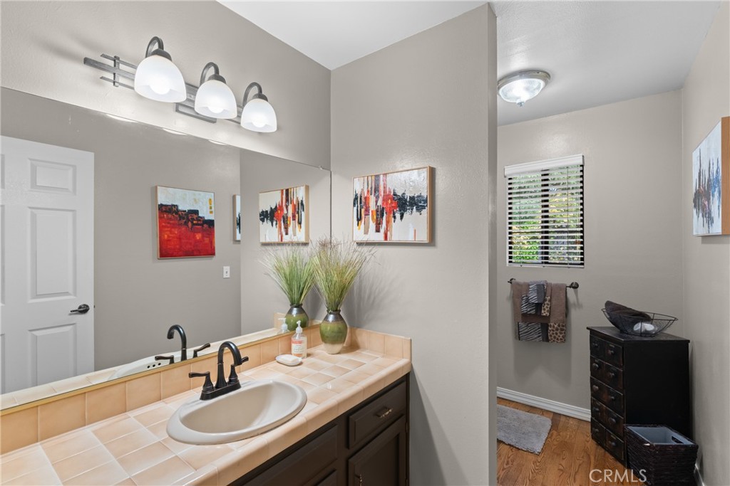802 Pierce Drive Santa Maria, CA 93454 - Photo 20 of 42 a bathroom with a sink and a mirror