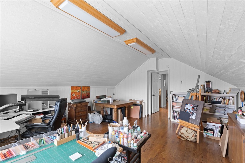 802 Pierce Drive Santa Maria, CA 93454 - Photo 27 of 42 a bed room with a bed and a book shelf