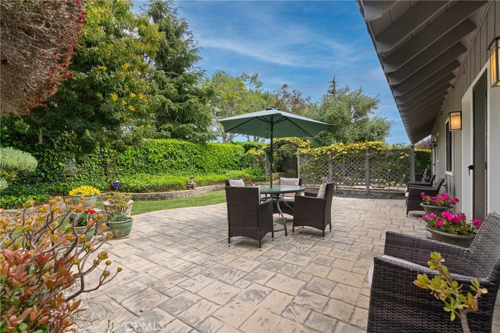 802 Pierce Drive Santa Maria, CA 93454 - Photo 29 of 42 a view of a patio with chairs and potted plants