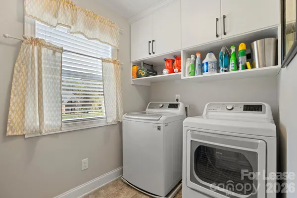 a view of washer and dryer in a utility room