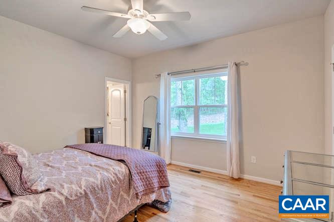 2508 Buck Island Road Charlottesville, VA 22902 - Photo 12 of 23 a bedroom with a large bed and a window