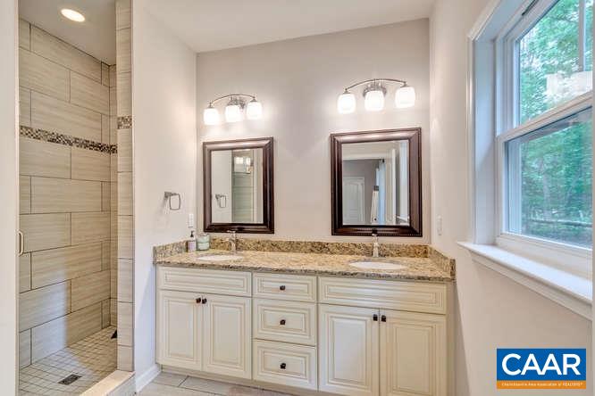 2508 Buck Island Road Charlottesville, VA 22902 - Photo 13 of 23 a bathroom with double sink and a mirror