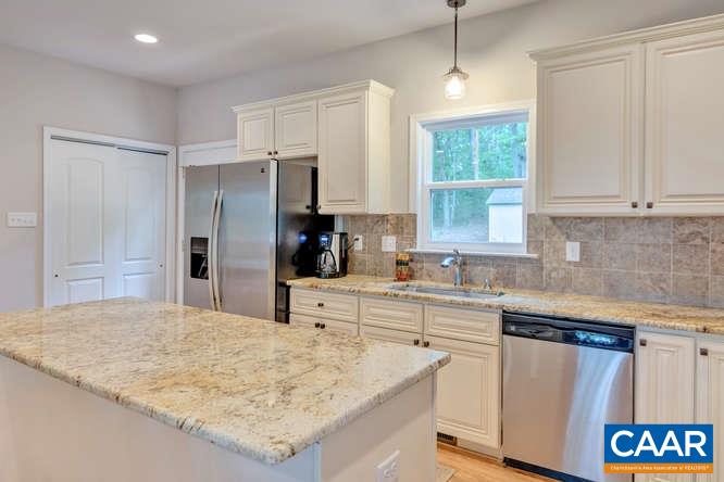 2508 Buck Island Road Charlottesville, VA 22902 - Photo 6 of 23 a kitchen with a sink stove and refrigerator
