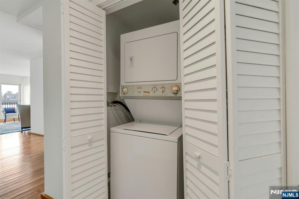 3219 City Place Edgewater, NJ 07020 - Photo 23 of 28 a utility room with dryer and washer