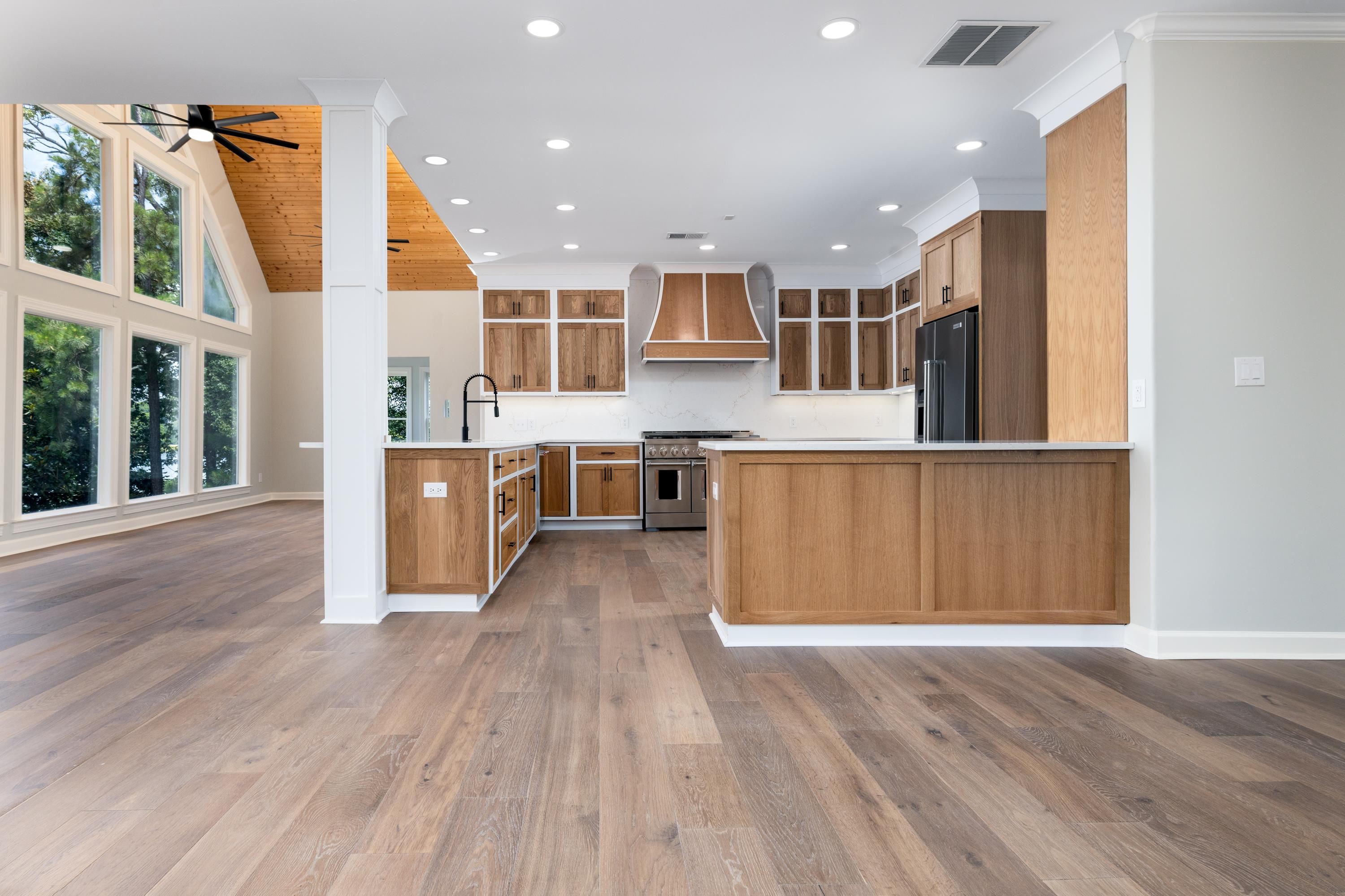 4175 Cedar Point Road Lakeland, TN 38002 - Photo 36 of 37 a view of kitchen with stainless steel appliances granite countertop a stove and a wooden floors
