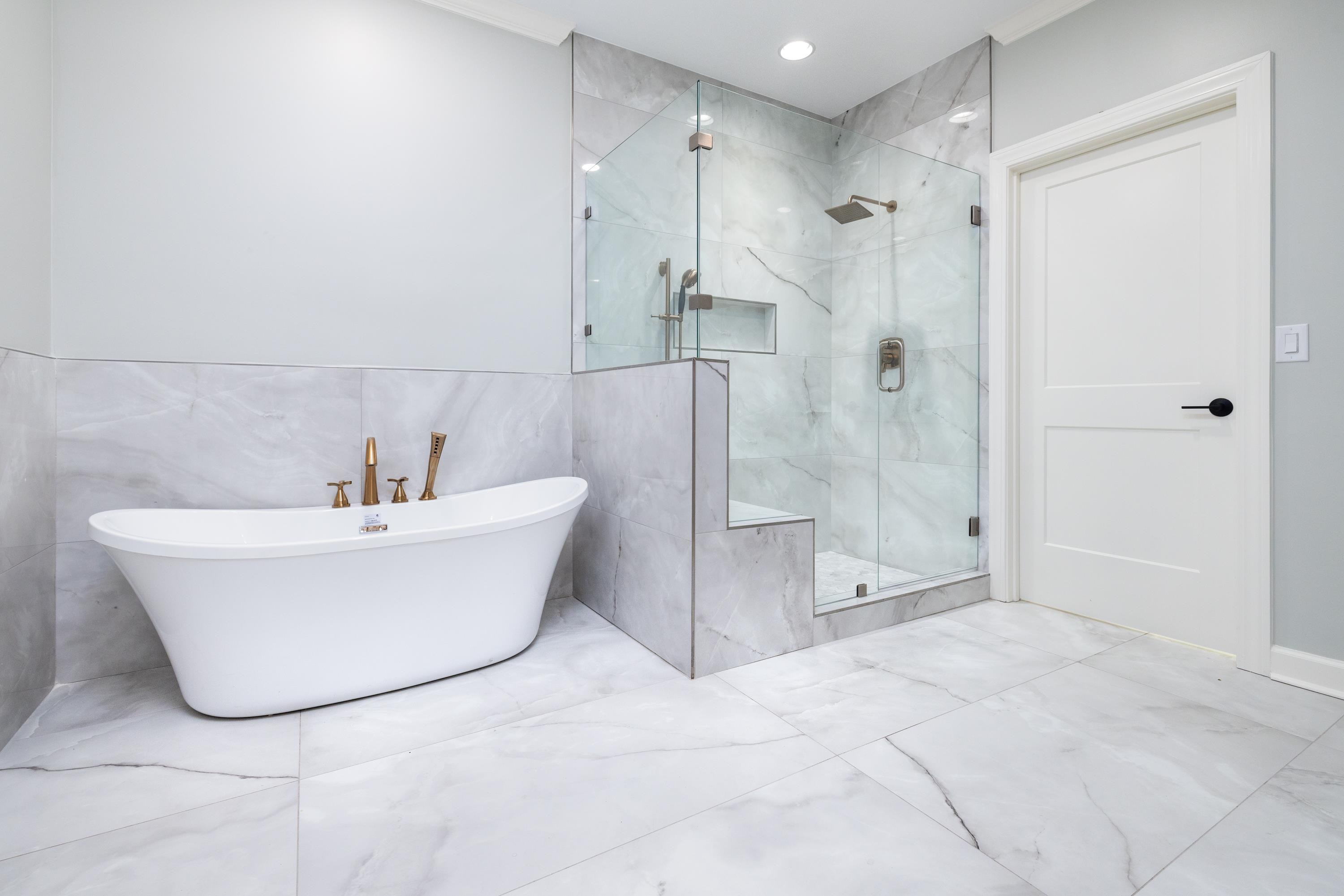 4175 Cedar Point Road Lakeland, TN 38002 - Photo 37 of 37 a bathroom with a bathtub and shower