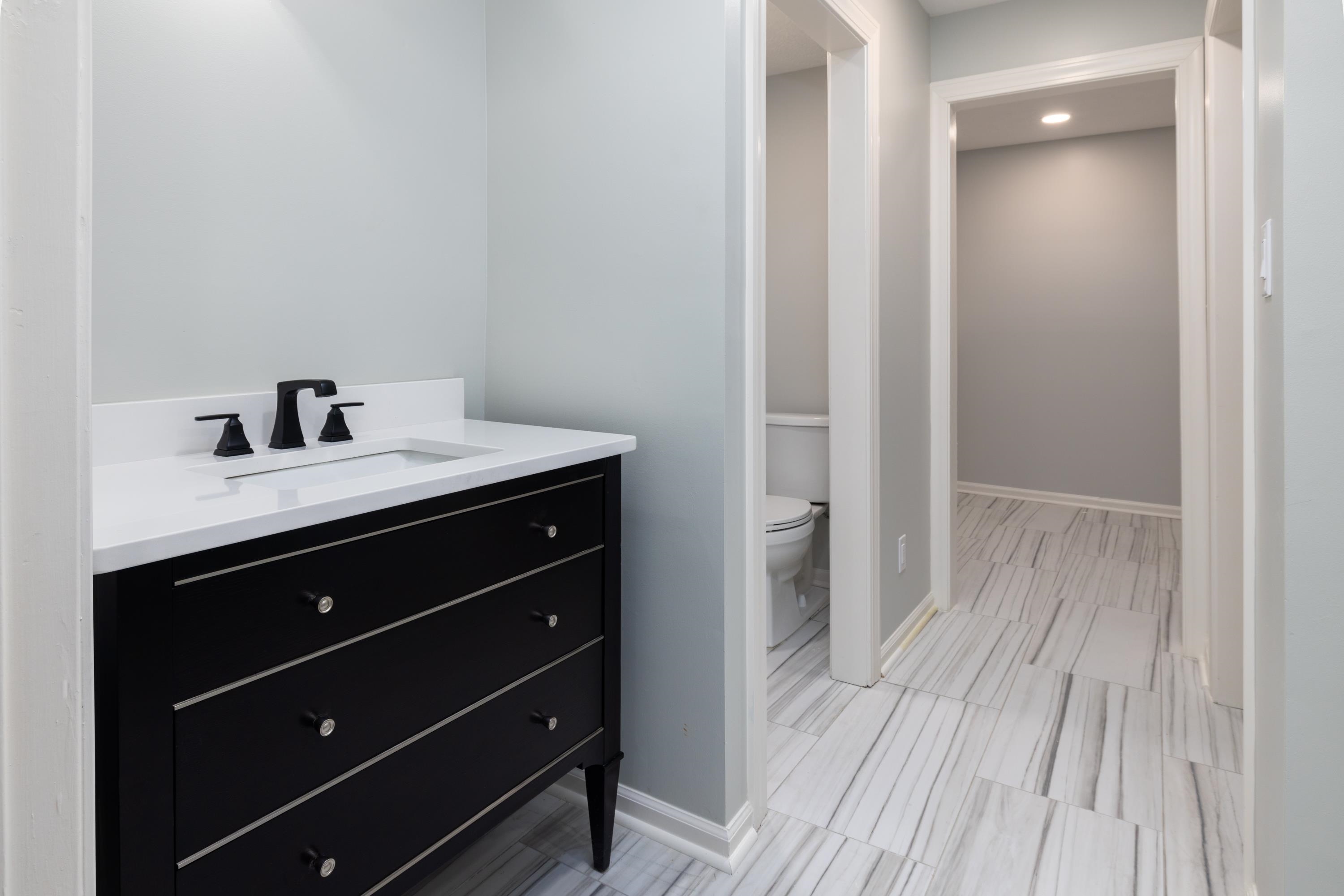 4175 Cedar Point Road Lakeland, TN 38002 - Photo 11 of 37 a bathroom with a sink and a mirror