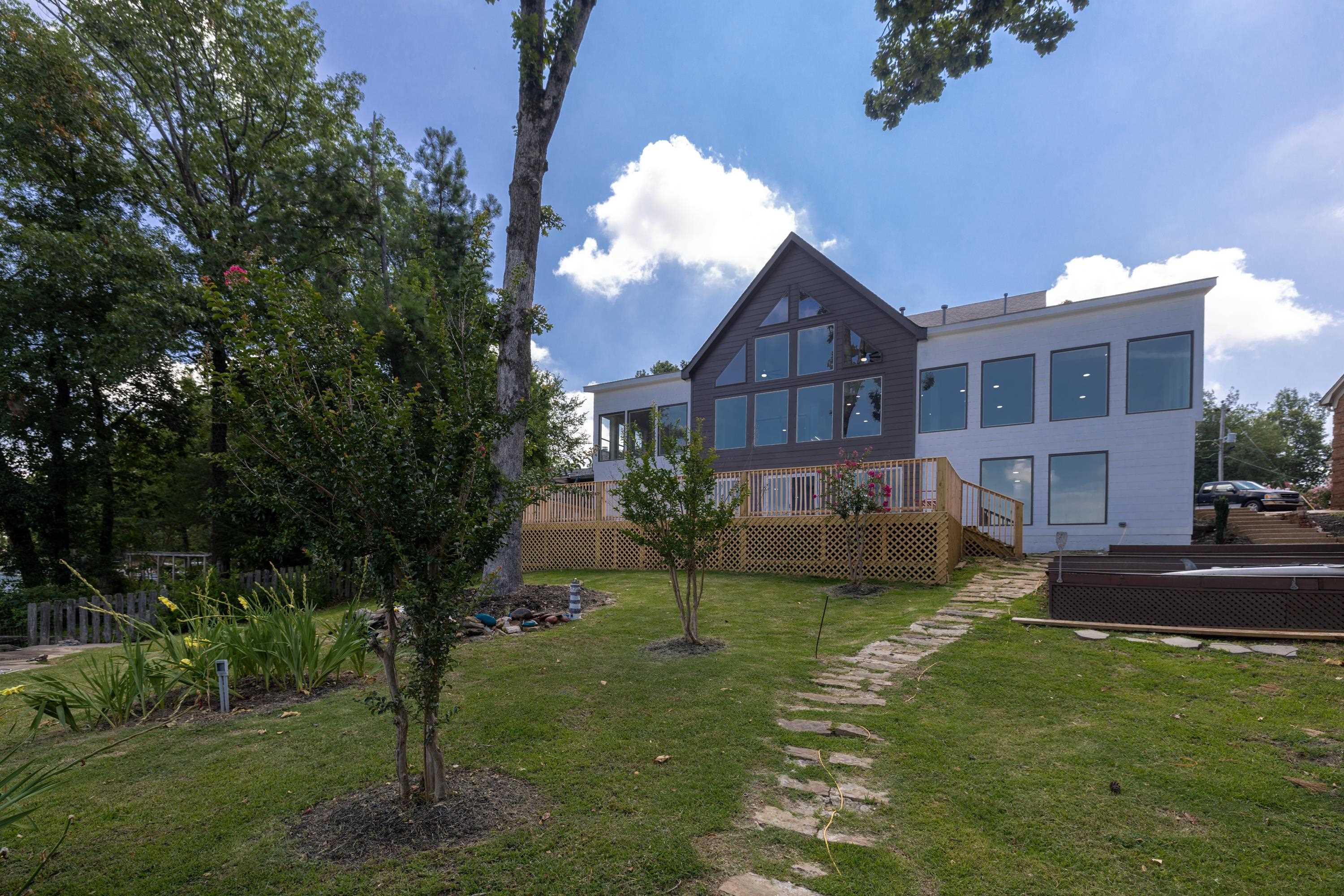 4175 Cedar Point Road Lakeland, TN 38002 - Photo 16 of 37 a view of a house with a yard