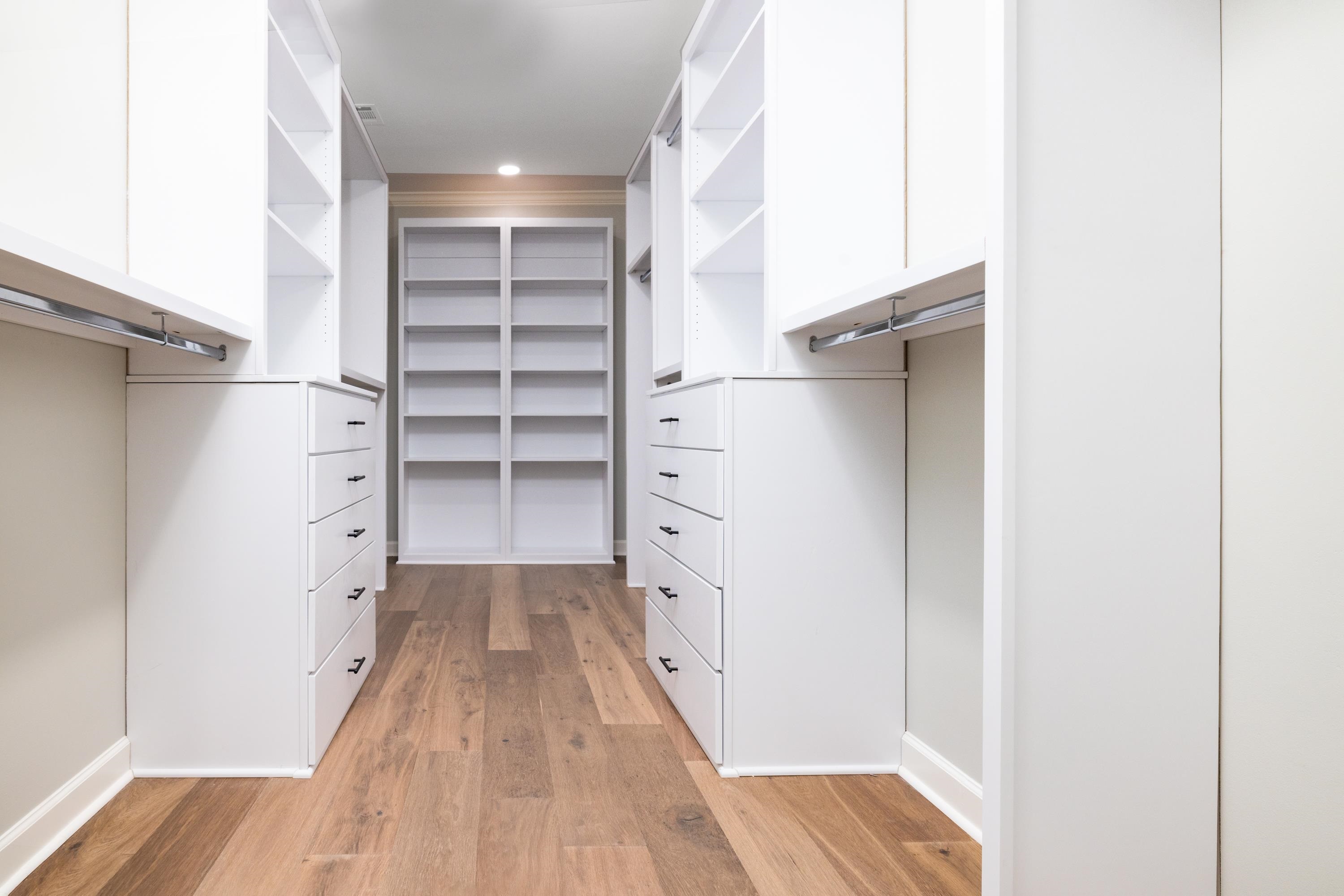 4175 Cedar Point Road Lakeland, TN 38002 - Photo 2 of 37 a view of walk in closet with empty racks