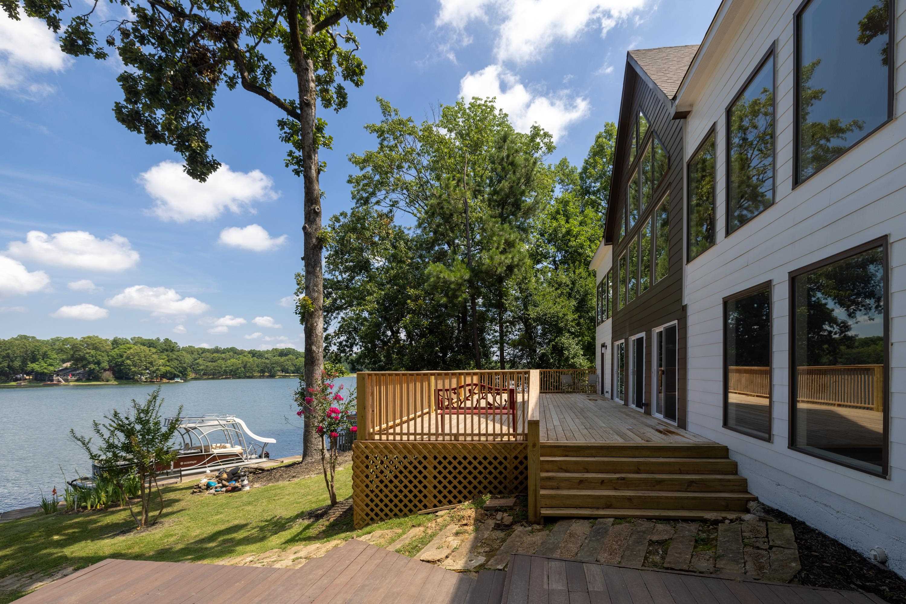 4175 Cedar Point Road Lakeland, TN 38002 - Photo 19 of 37 a view of a patio with two chairs and a table