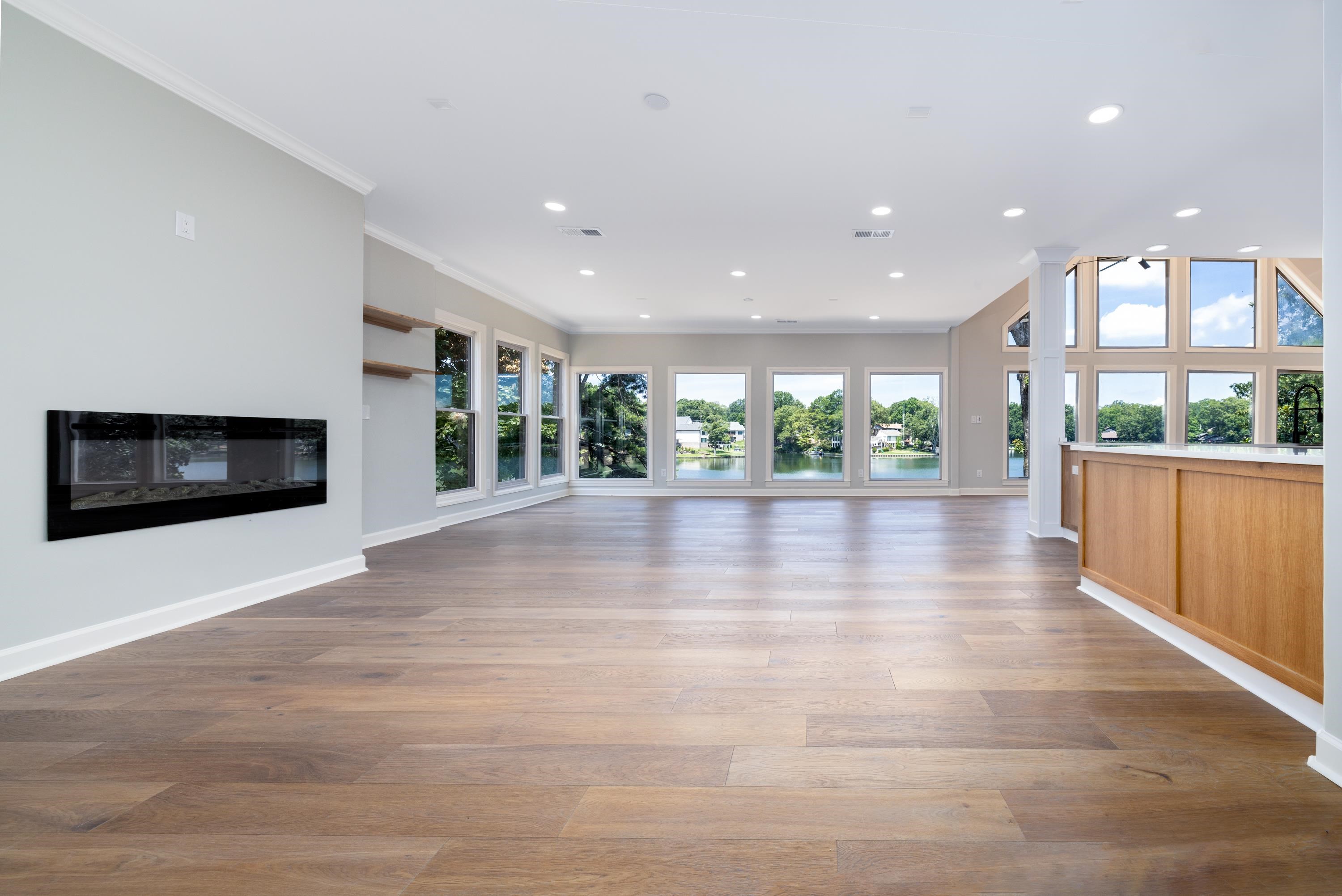 4175 Cedar Point Road Lakeland, TN 38002 - Photo 20 of 37 a view of an empty room with wooden floor and a window