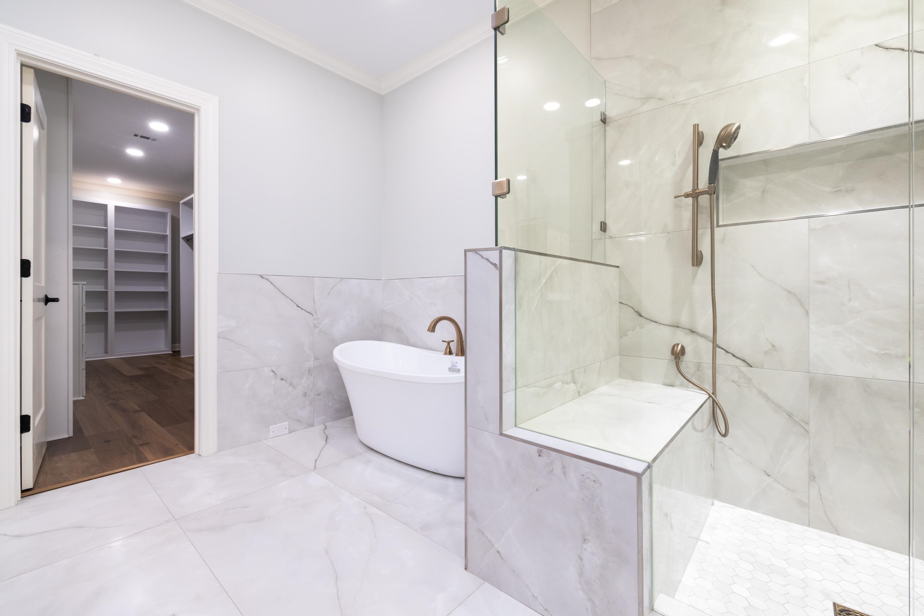 4175 Cedar Point Road Lakeland, TN 38002 - Photo 3 of 37 a bathroom with a bathtub and a shower