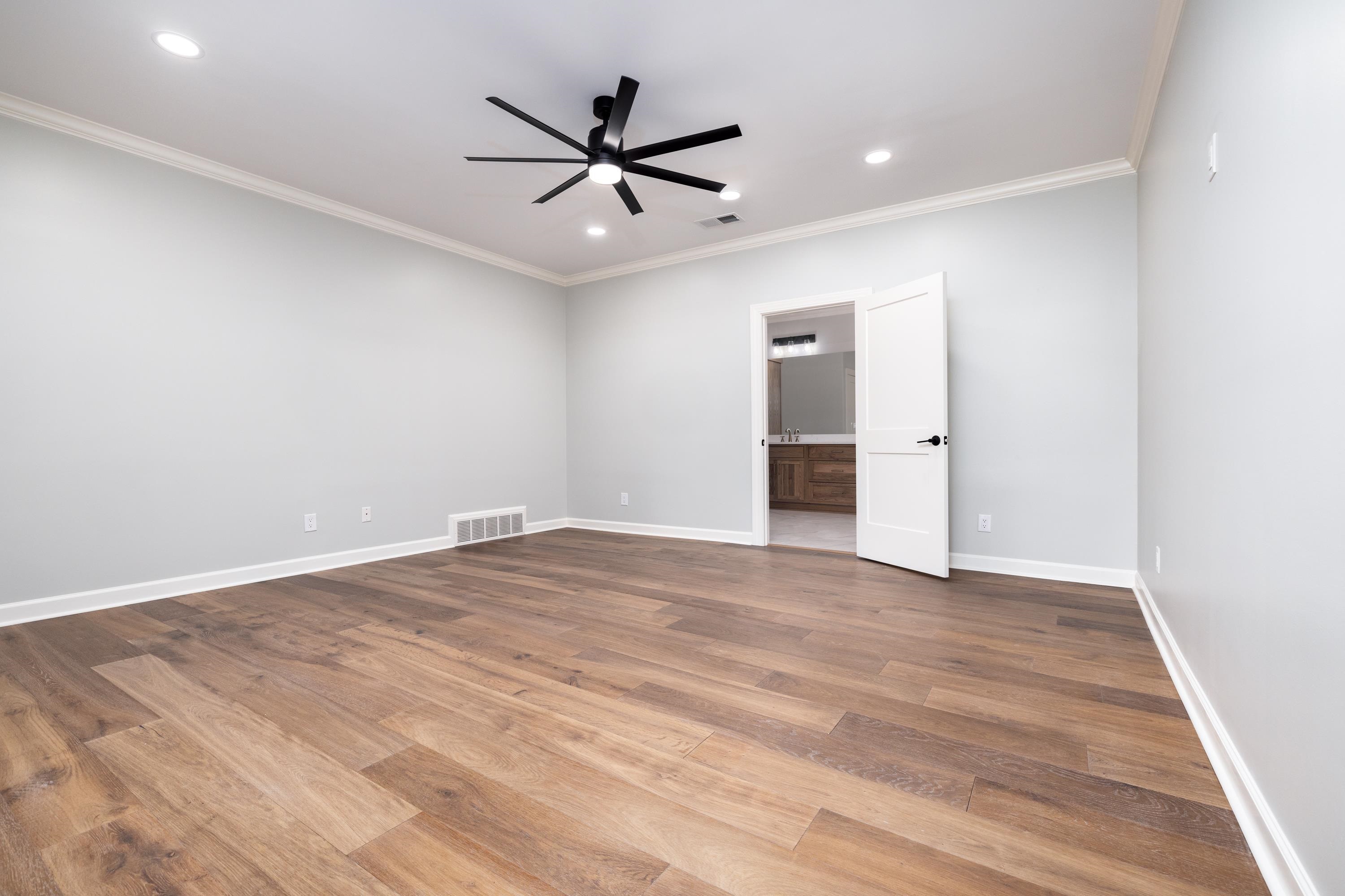 4175 Cedar Point Road Lakeland, TN 38002 - Photo 30 of 37 wooden floor in an empty room