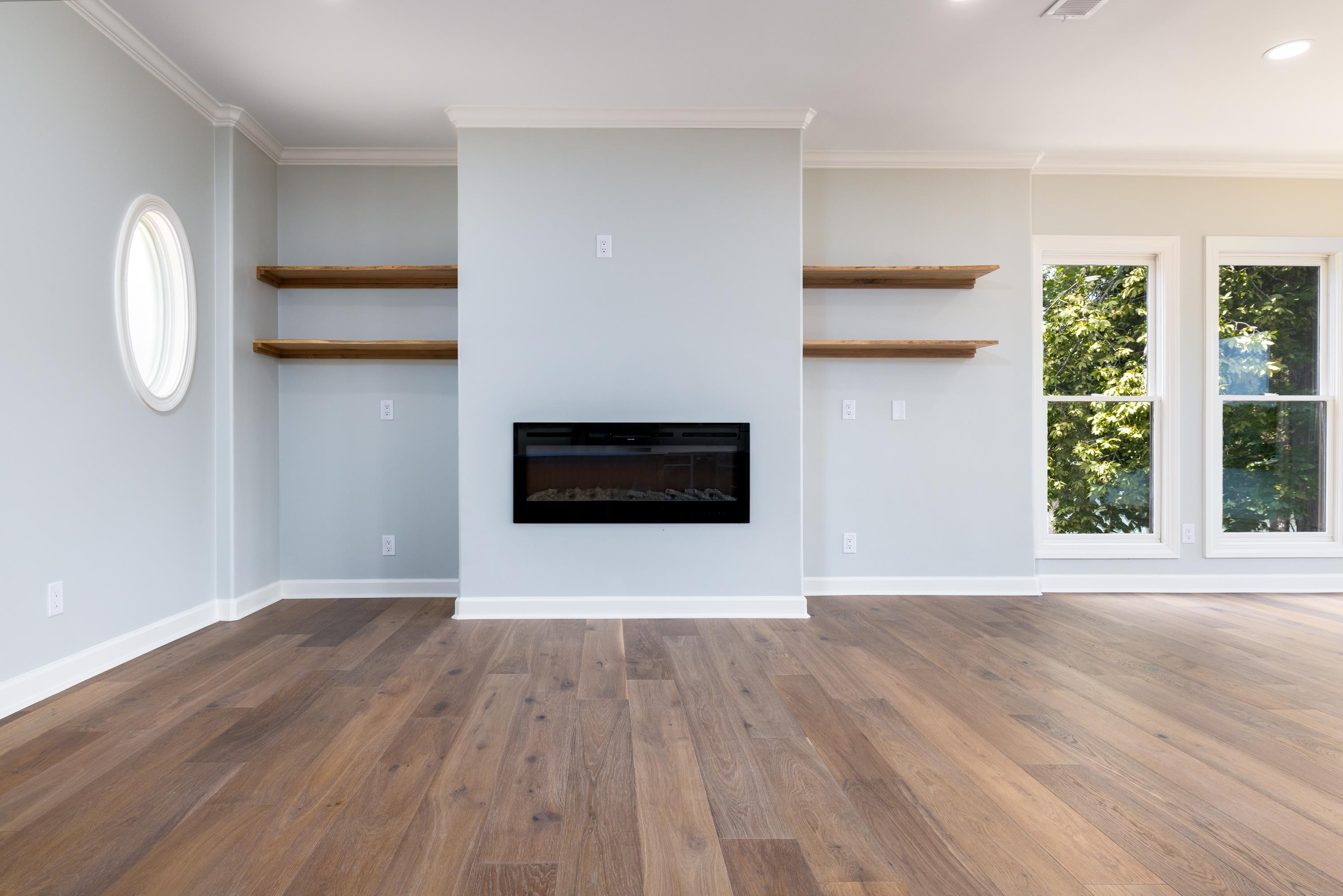 4175 Cedar Point Road Lakeland, TN 38002 - Photo 9 of 37 a view of a livingroom with wooden floor