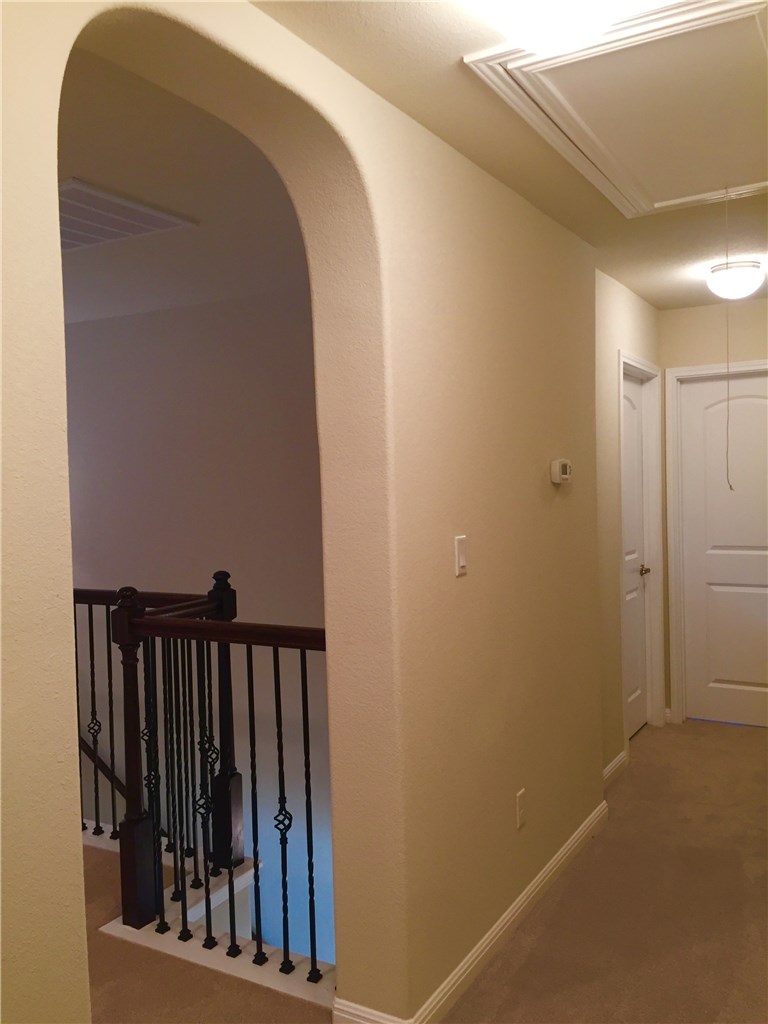 3451 Mayfield Ranch Boulevard, Unit 703 Round Rock, TX 78681 - Photo 18 of 23 a view of a staircase