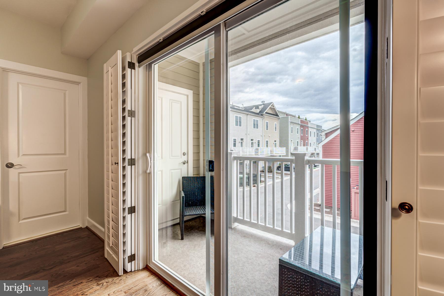 2207 Main Line Boulevard, Unit 101 Alexandria, VA 22301 - Photo 43 of 46 a view of a balcony from a door