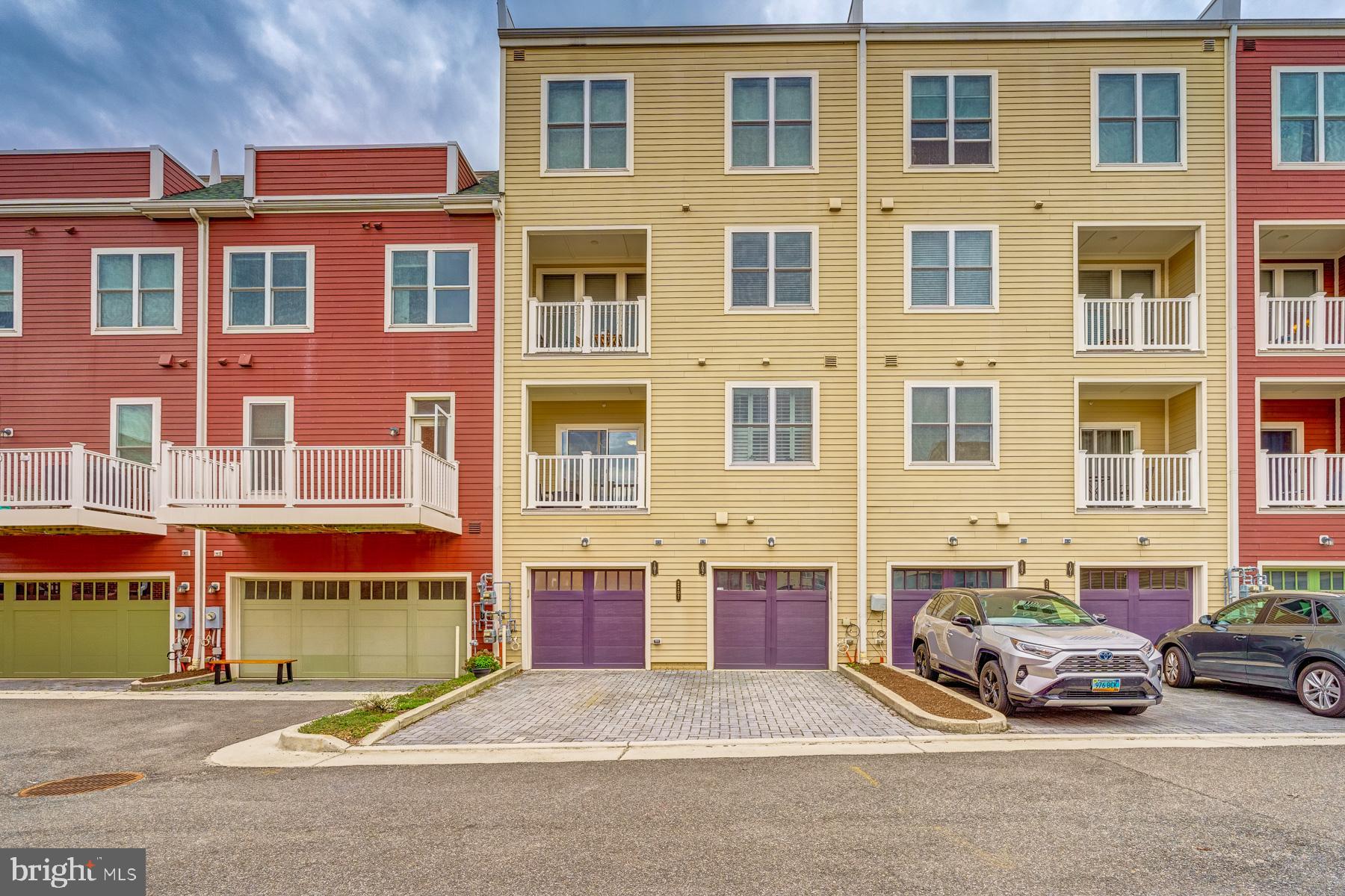 2207 Main Line Boulevard, Unit 101 Alexandria, VA 22301 - Photo 45 of 46 a car parked in front of a building