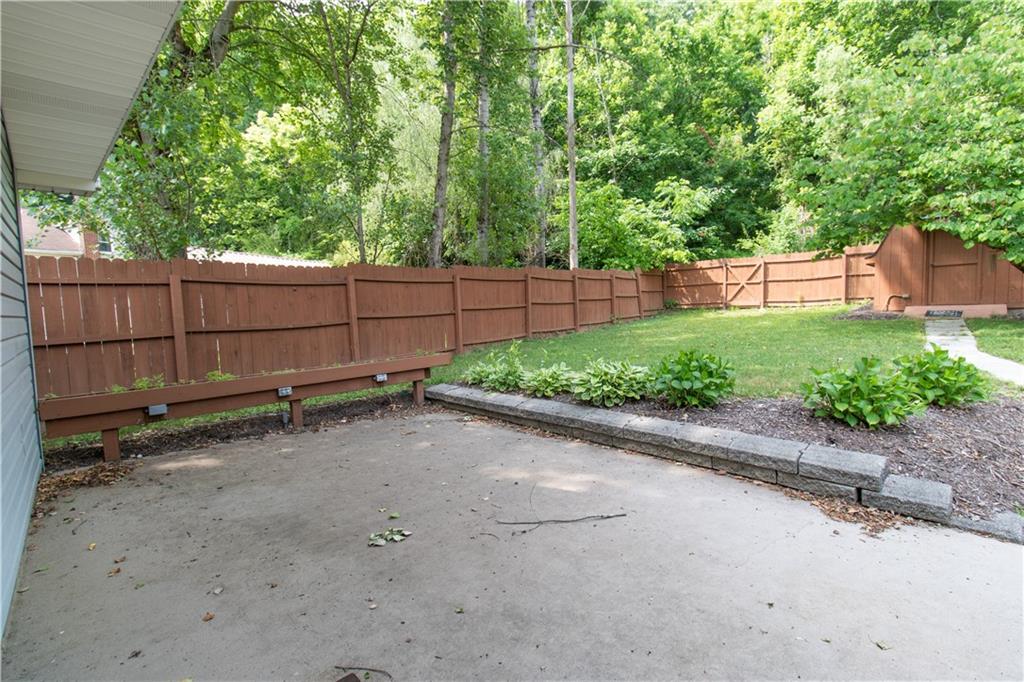 2111 Lewis Run Road Clairton, PA 15025 - Photo 16 of 17 a view of a backyard with wooden fence