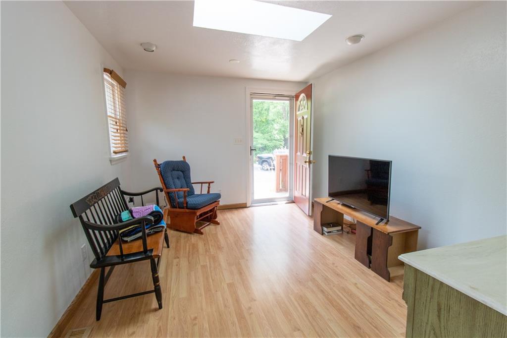 2111 Lewis Run Road Clairton, PA 15025 - Photo 4 of 17 a living room with furniture and a flat screen tv