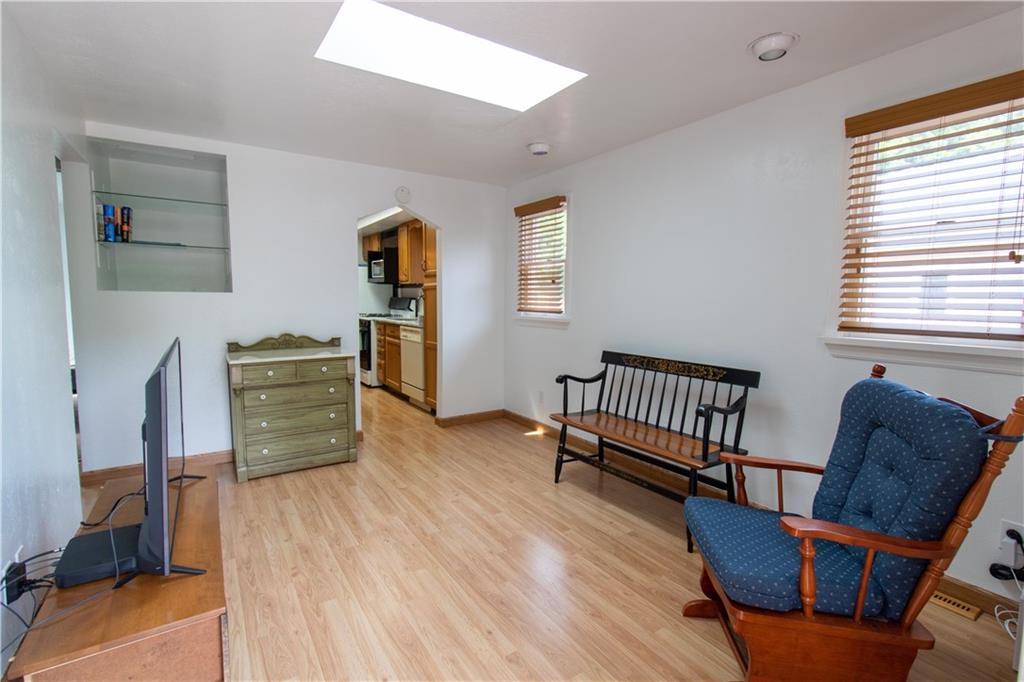 2111 Lewis Run Road Clairton, PA 15025 - Photo 5 of 17 a living room with furniture and a wooden floor