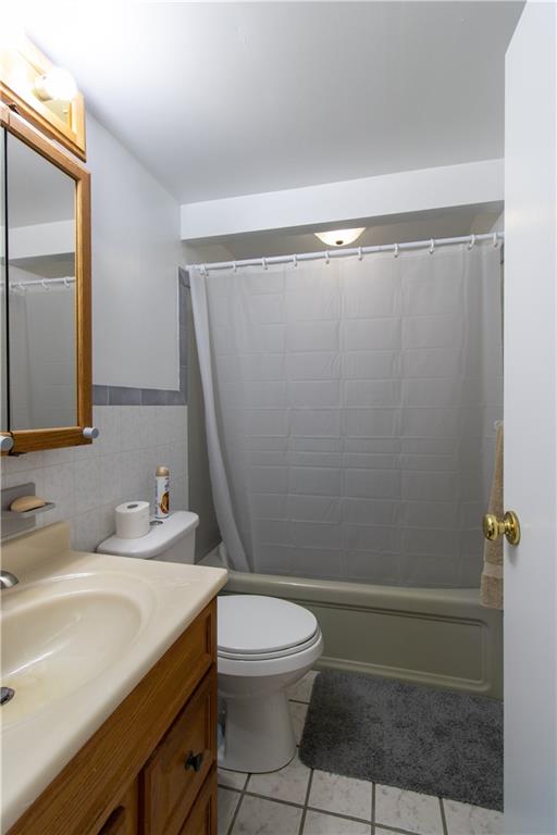 2111 Lewis Run Road Clairton, PA 15025 - Photo 10 of 17 a bathroom with a sink a toilet and shower