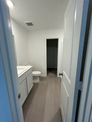 a bathroom with a sink and toilet