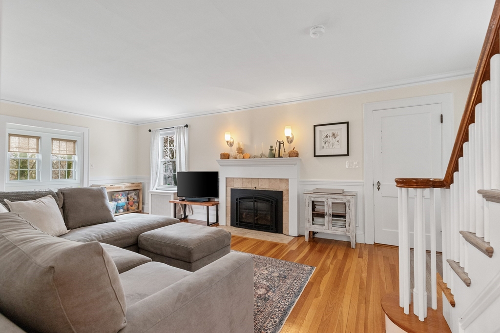 33 Ashcroft Road Medford, MA 02155 - Photo 4 of 30 a living room with furniture and a fireplace