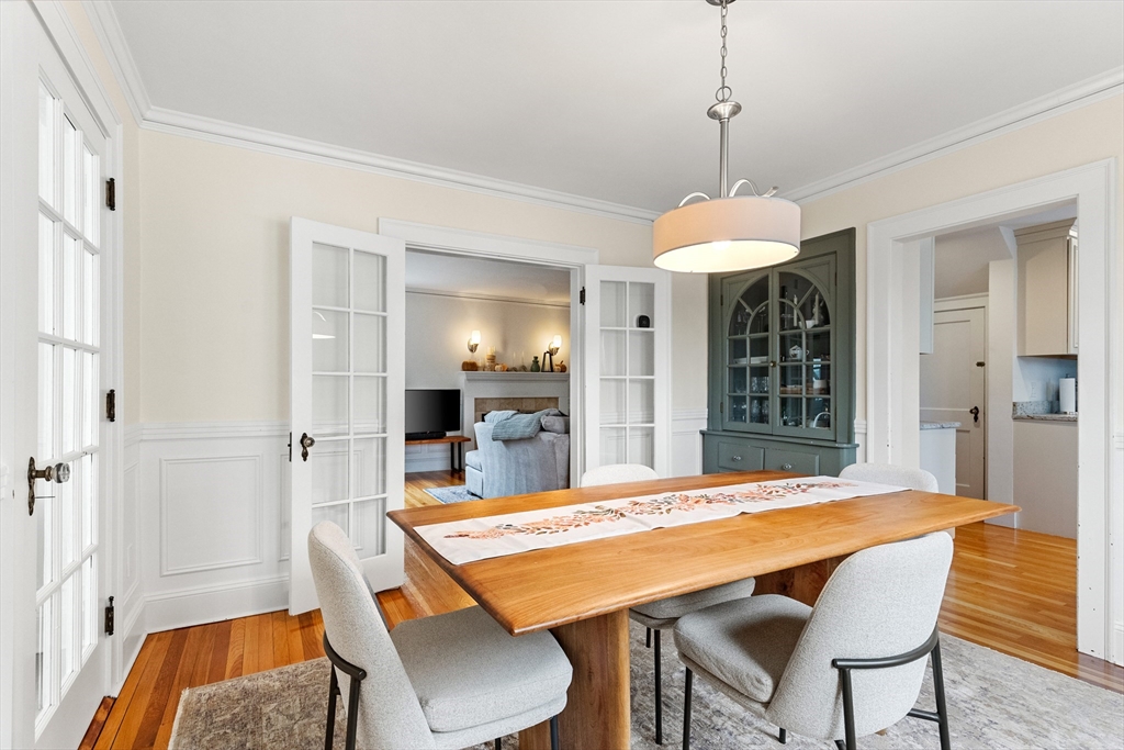 33 Ashcroft Road Medford, MA 02155 - Photo 5 of 30 a dining room with a table chairs and a dining table