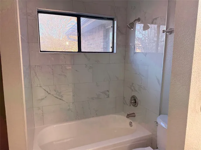 a bathroom with a bathtub