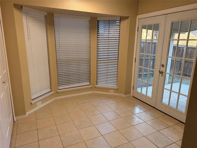 a view of an empty room with window