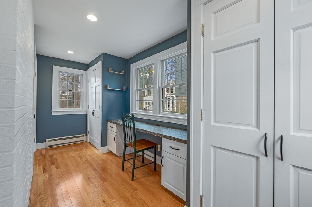 38 Cerdan Avenue Boston, MA 02132 - Photo 19 of 40 a livingroom with workspace and a window