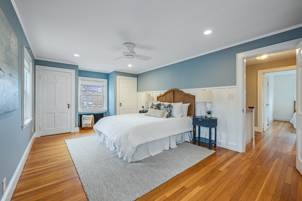 38 Cerdan Avenue Boston, MA 02132 - Photo 23 of 40 a spacious bedroom with a bed and a table