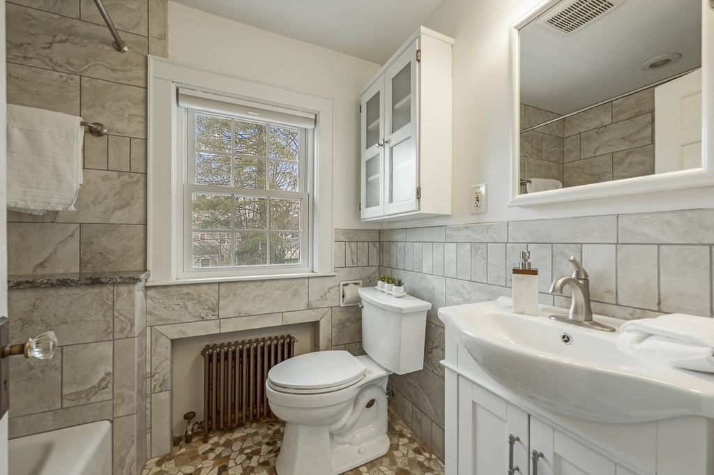38 Cerdan Avenue Boston, MA 02132 - Photo 29 of 40 a bathroom with a sink toilet and shower