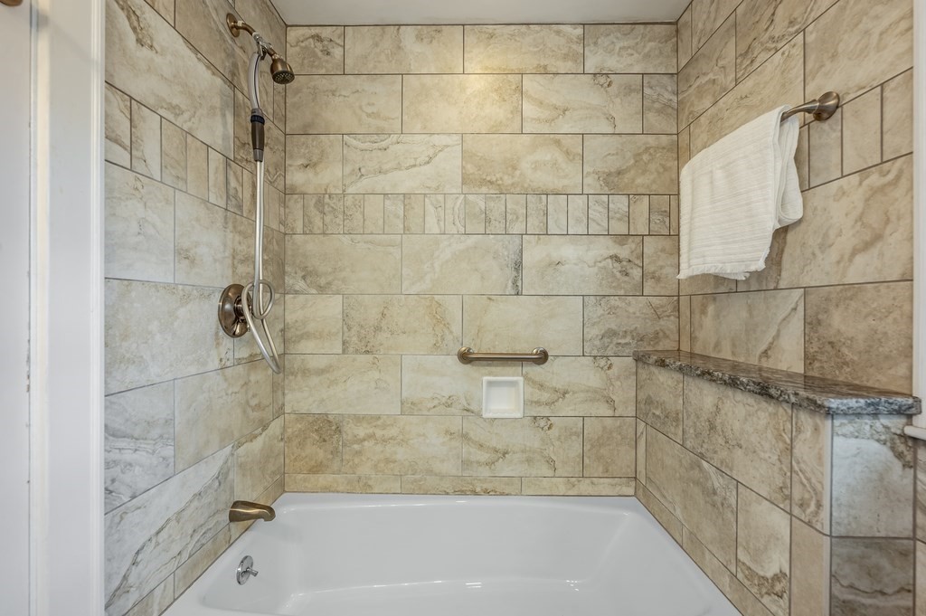 38 Cerdan Avenue Boston, MA 02132 - Photo 30 of 40 a bathroom with a bathtub