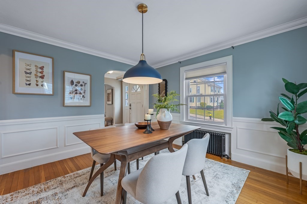 38 Cerdan Avenue Boston, MA 02132 - Photo 5 of 40 a view of a dining room with furniture window and wooden floor