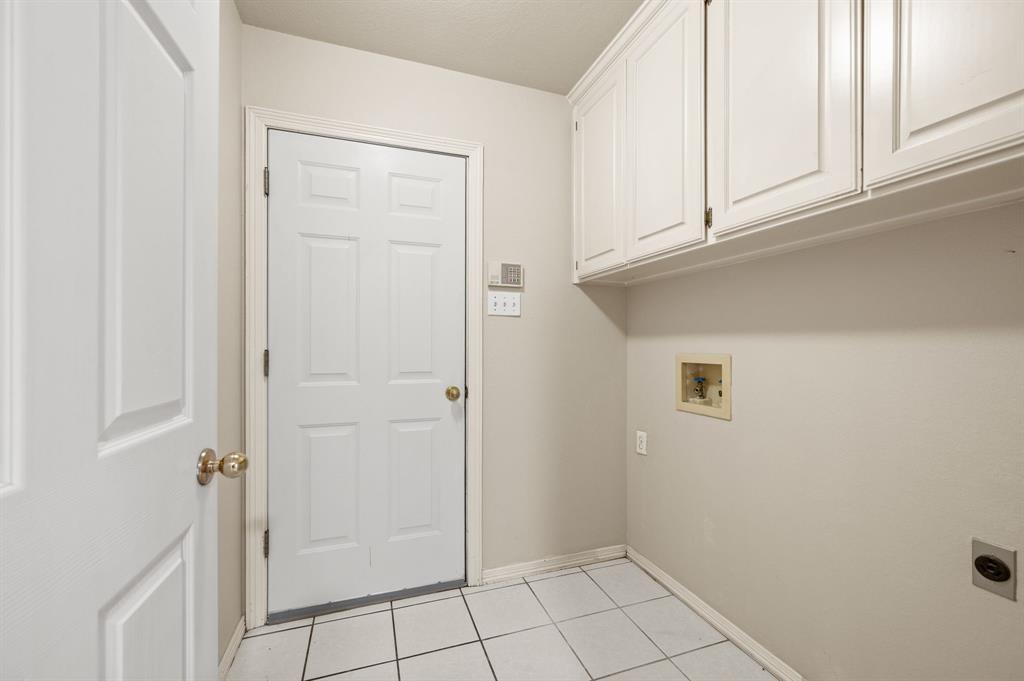 924 Hardie Street Hurst, TX 76053 - Photo 17 of 32 a view of an empty room