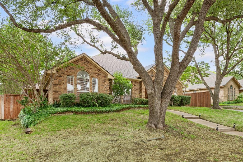 924 Hardie Street Hurst, TX 76053 - Photo 7 of 32 a view of a house with a yard
