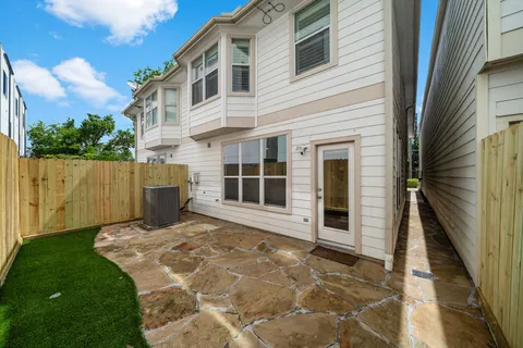a view of front door and yard